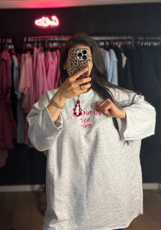 Oversized Sweater bestickt grau